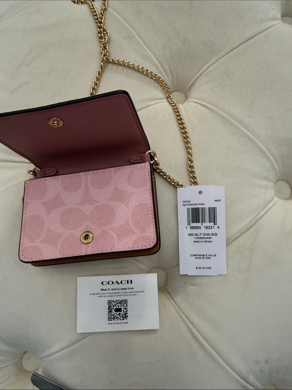 COACH Mini Wallet On A Chain
In Signature Canvas With Charms - Picture 15 of 17